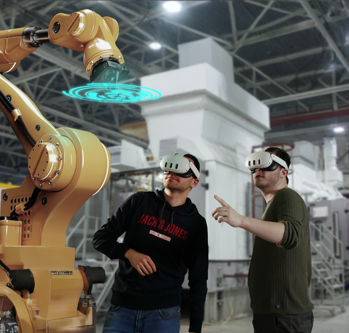 Zwei Personen mit VR-Headsets in einer industriellen Umgebung